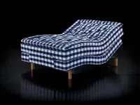 Bed in one and a half sizes Adjustable with headboard and footboard that can be raised and lowered by Hastens