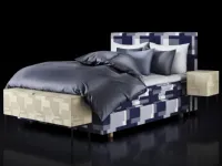 Bed with Appaloosa headboard by Hastens