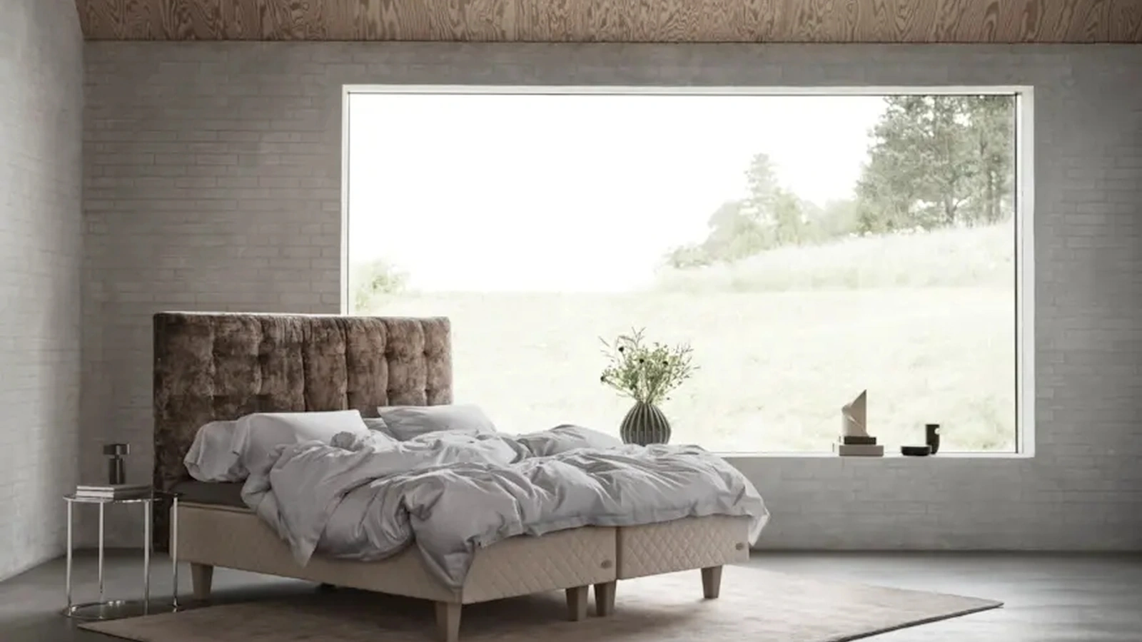 Double bed with Dante headboard by Duxiana