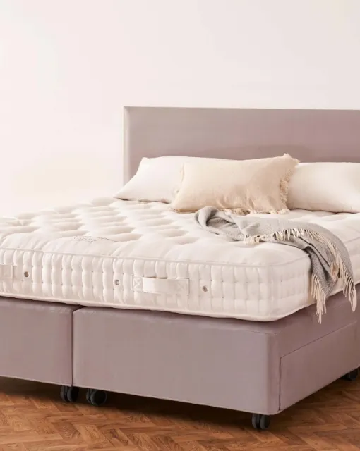 Bed with Muses headboard by Vispring