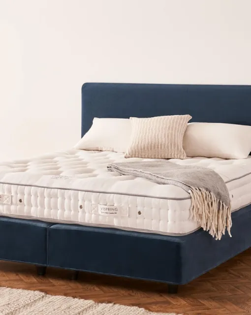 Bed with Rhea headboard by Vispring