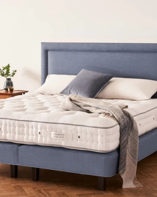 Bed with Helios headboard by Vispring