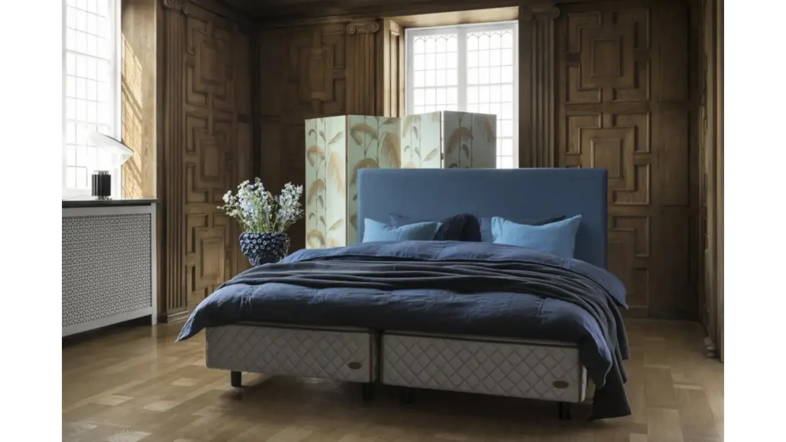 Bed with Astoria headboard by Duxiana