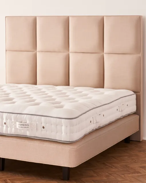 Bed with Atlas headboard by Vispring