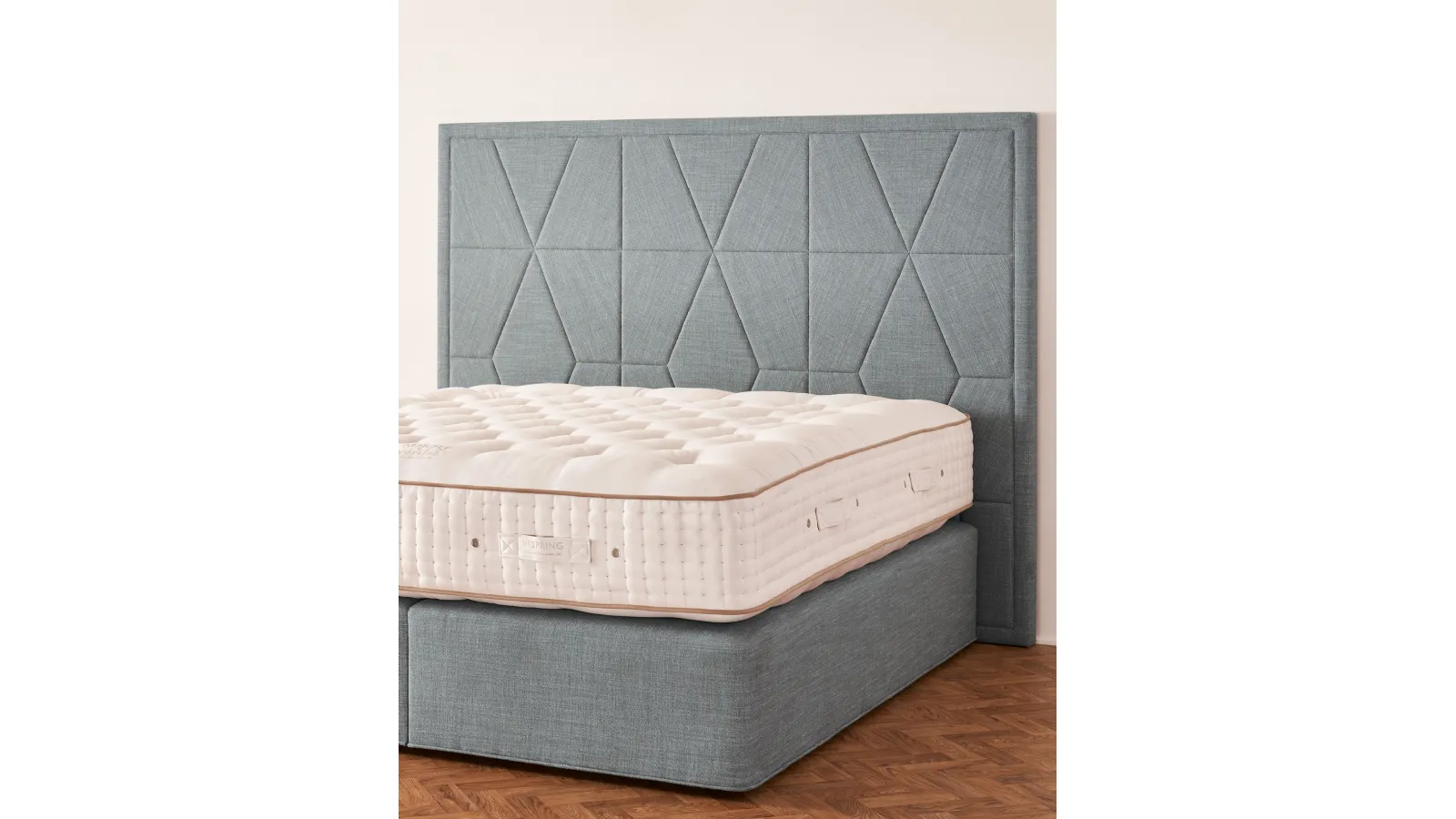 Bed with Berkeley headboard by Vispring
