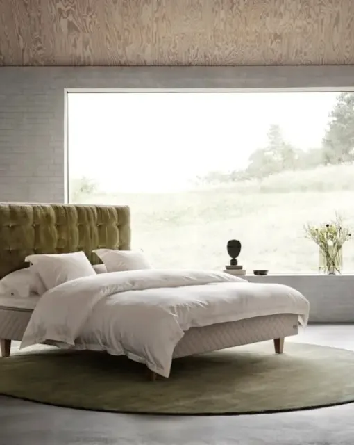 Double bed with Dante headboard by Duxiana