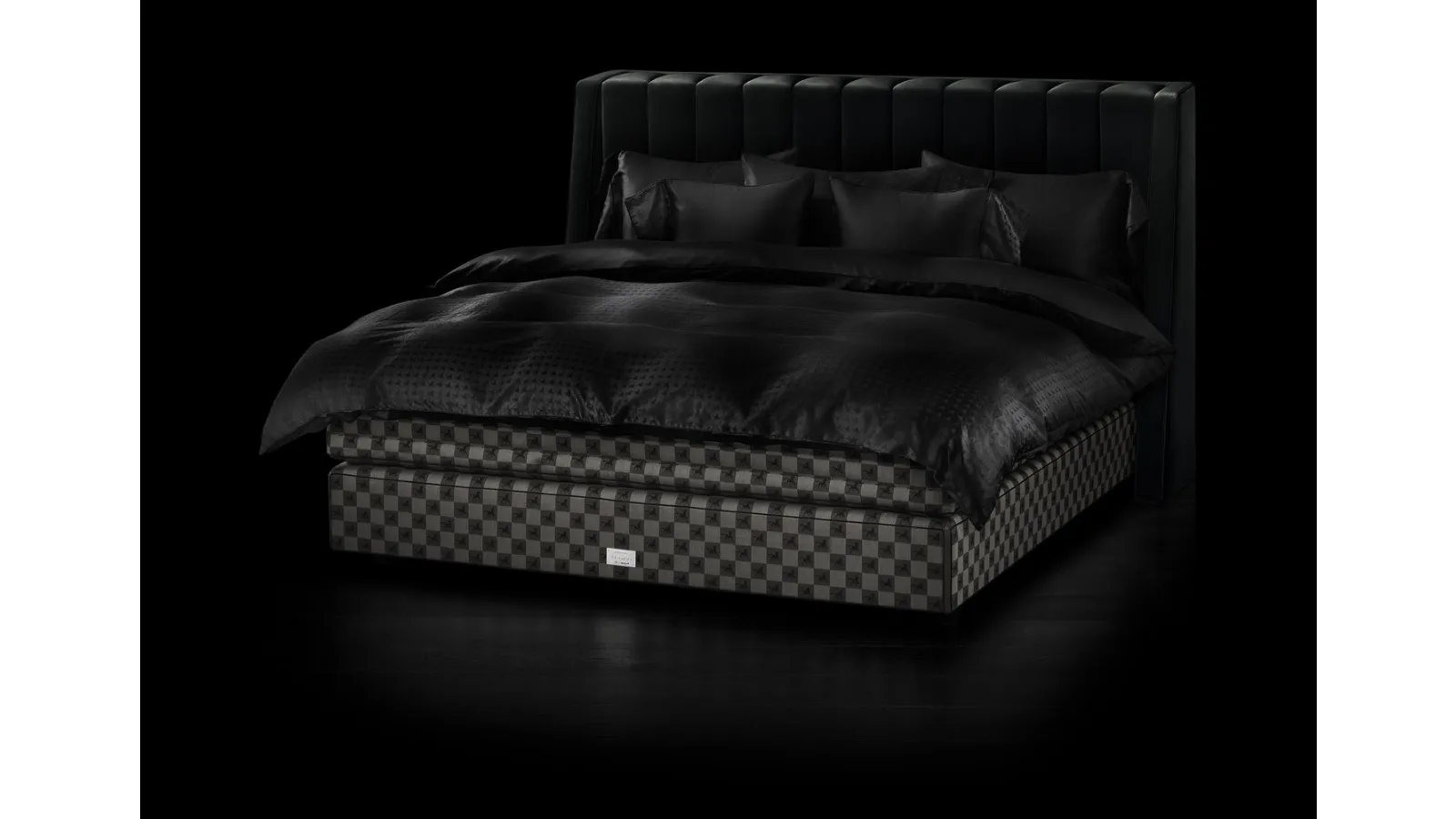 Fabric bed with Drēmər Black Shadow headboard by Hastens