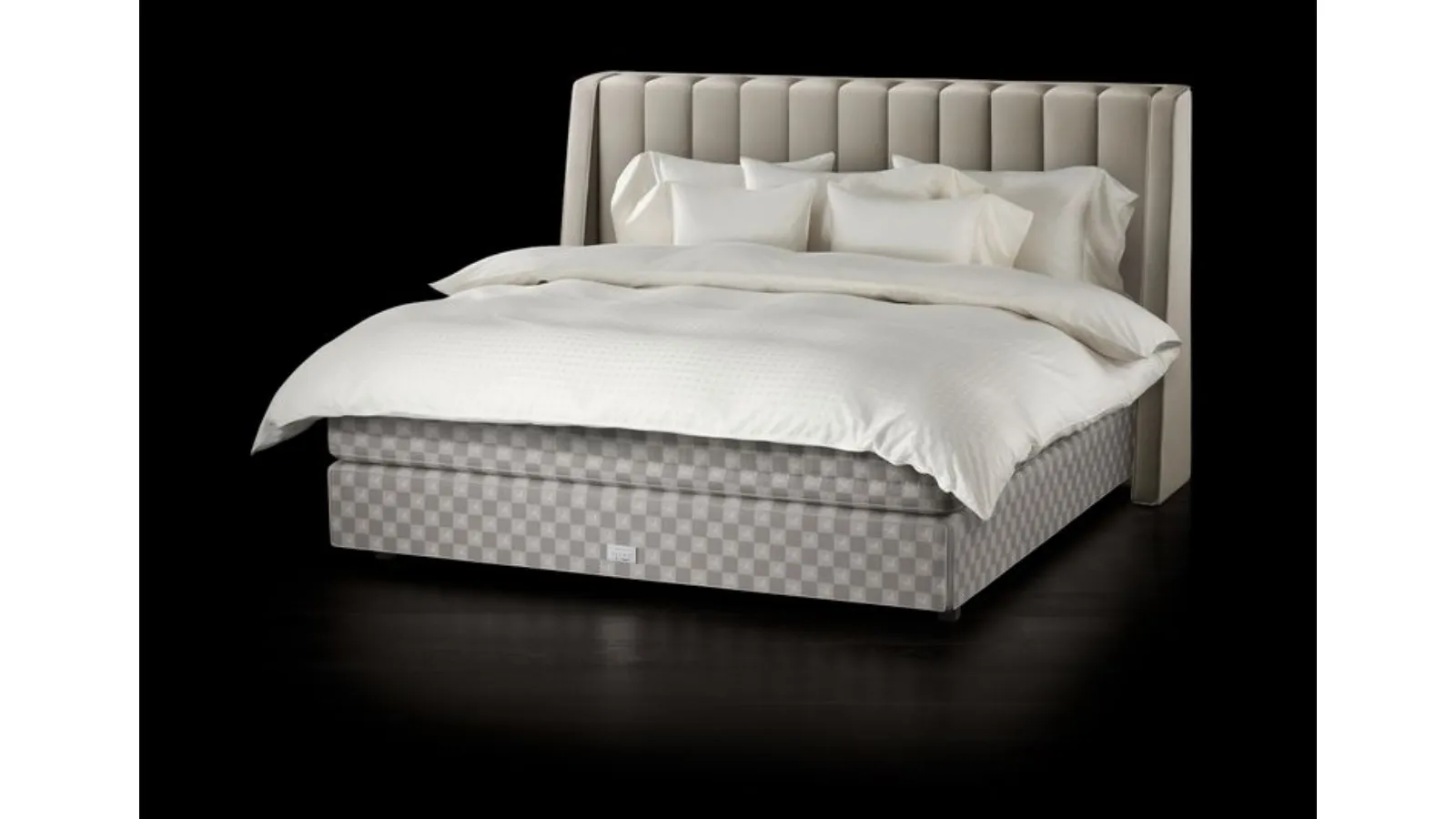 Fabric bed with Drēmər Natural Shale headboard by Hastens