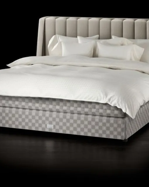 Fabric bed with Drēmər Natural Shale headboard by Hastens