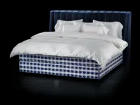 Fabric bed with Drēmər Traditional Blue headboard by Hastens