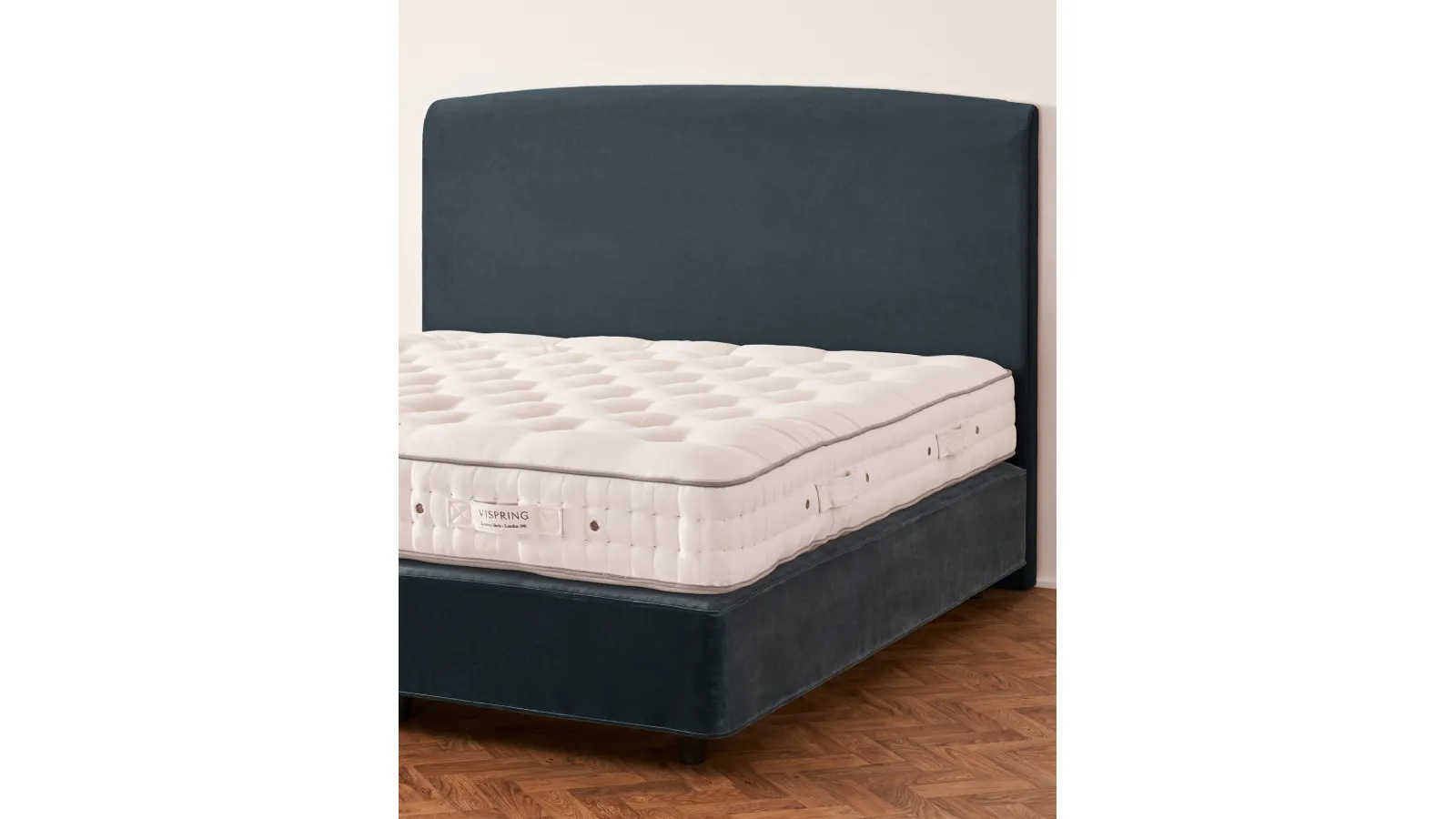 Bed with Elba headboard by Vispring