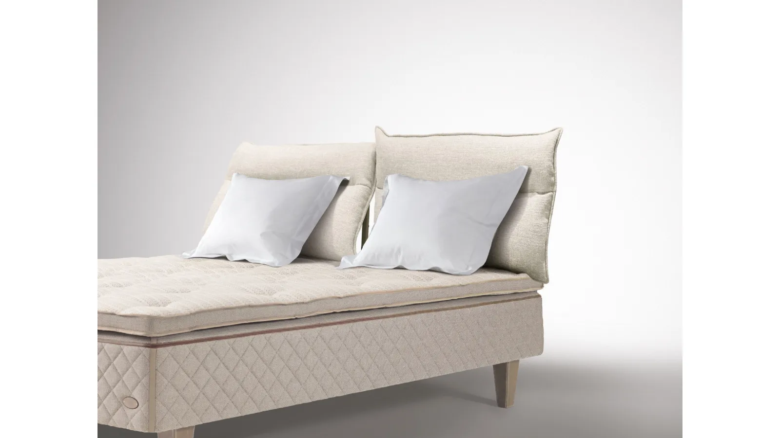 Bed with Flex Soft headboard by Duxiana