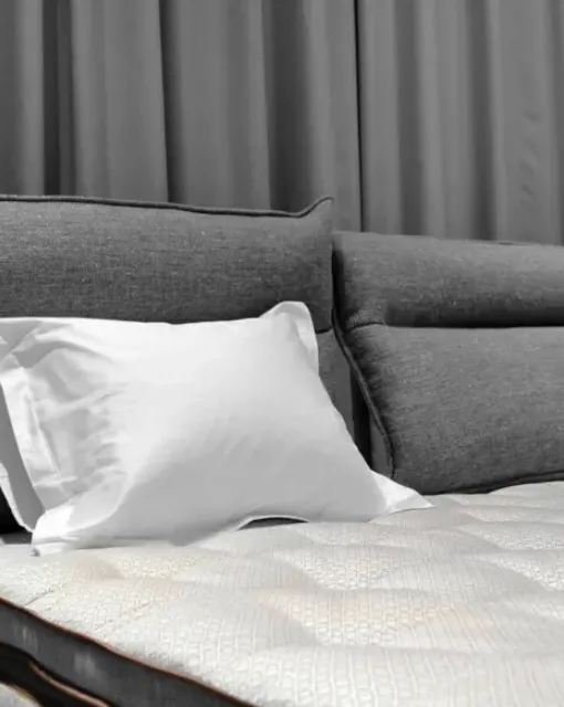 Bed with Flex Soft headboard by Duxiana