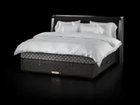 Fabric bed with Grand Vividus Phantom Charcoal headboard by Hastens