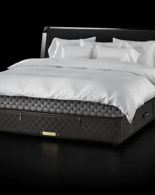 Fabric bed with Grand Vividus Phantom Charcoal headboard by Hastens