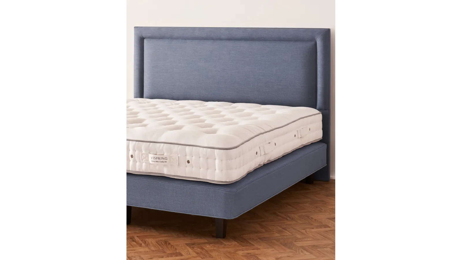 Bed with Helios headboard by Vispring