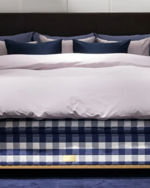 Bed with Marquis headboard by Hastens