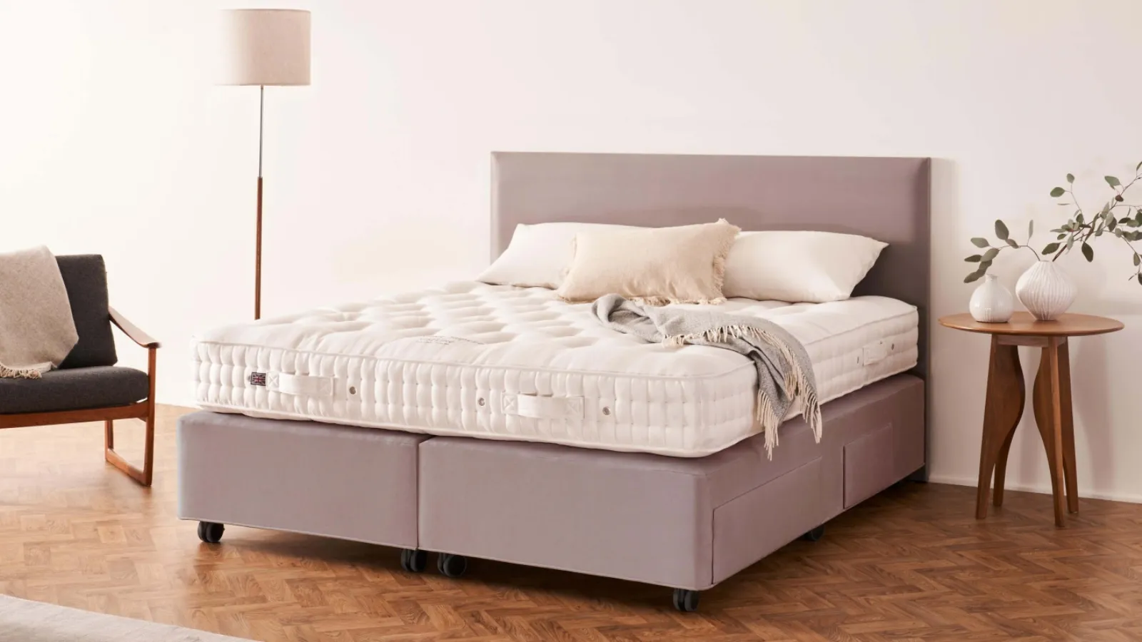 Bed with Muses headboard by Vispring