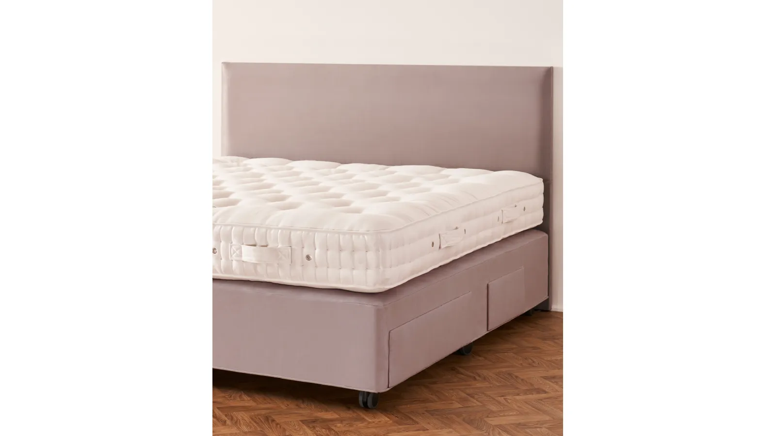 Bed with Muses headboard by Vispring