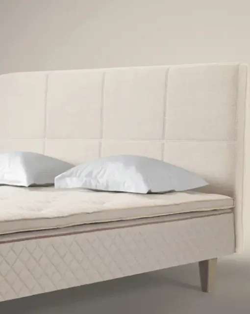 Bed with Quadro headboard by Duxiana