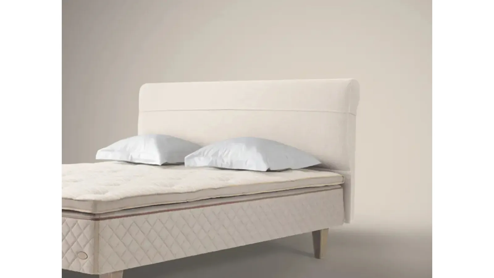 Bed with padded headboard Duxiana view