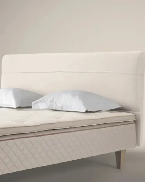 Bed with padded headboard Duxiana view